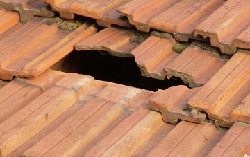 roof repair Rostholme, South Yorkshire